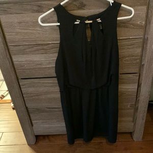 Brand new sleeveless black cocktail dress w metal neck detail